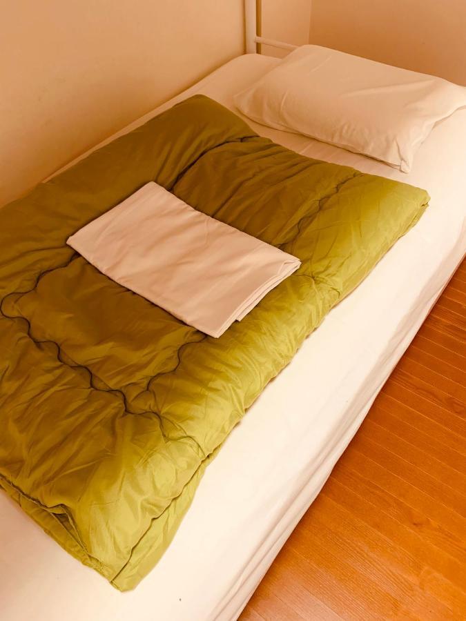 Guesthouse Shiawase Eki Fukuoka  Buitenkant foto