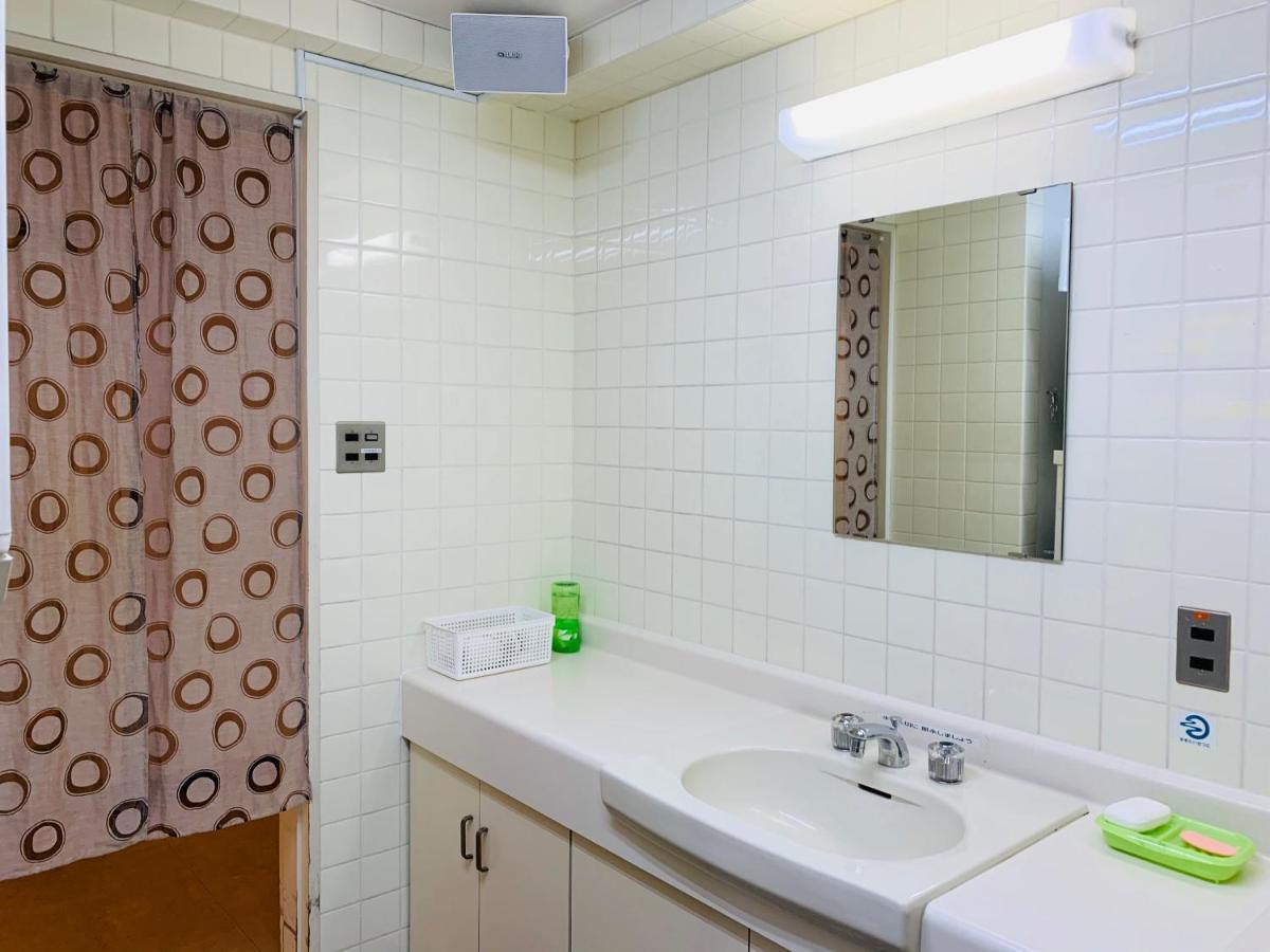 Guesthouse Shiawase Eki Fukuoka  Buitenkant foto