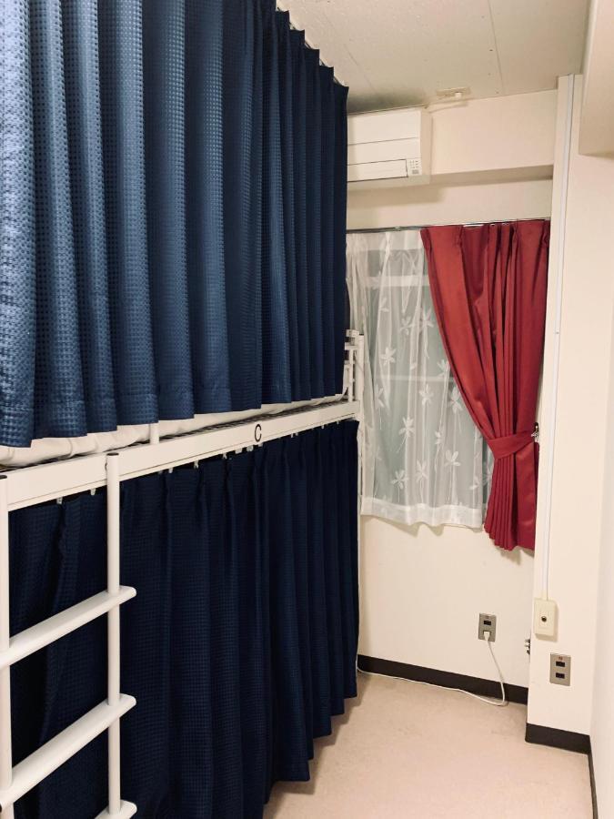 Guesthouse Shiawase Eki Fukuoka  Buitenkant foto