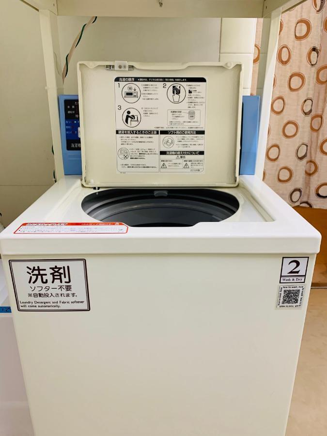 Guesthouse Shiawase Eki Fukuoka  Buitenkant foto