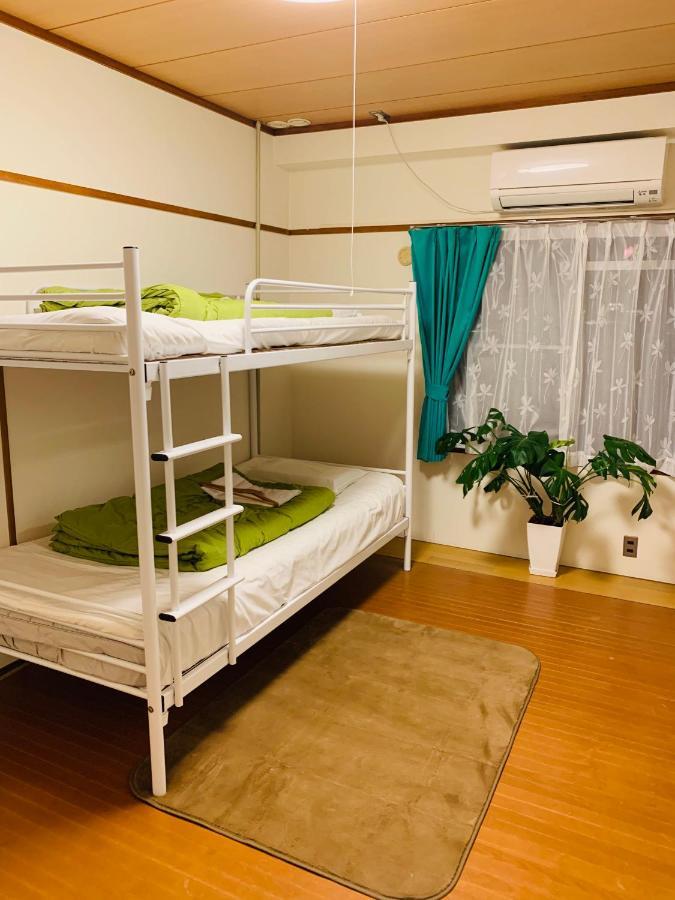 Guesthouse Shiawase Eki Fukuoka  Buitenkant foto